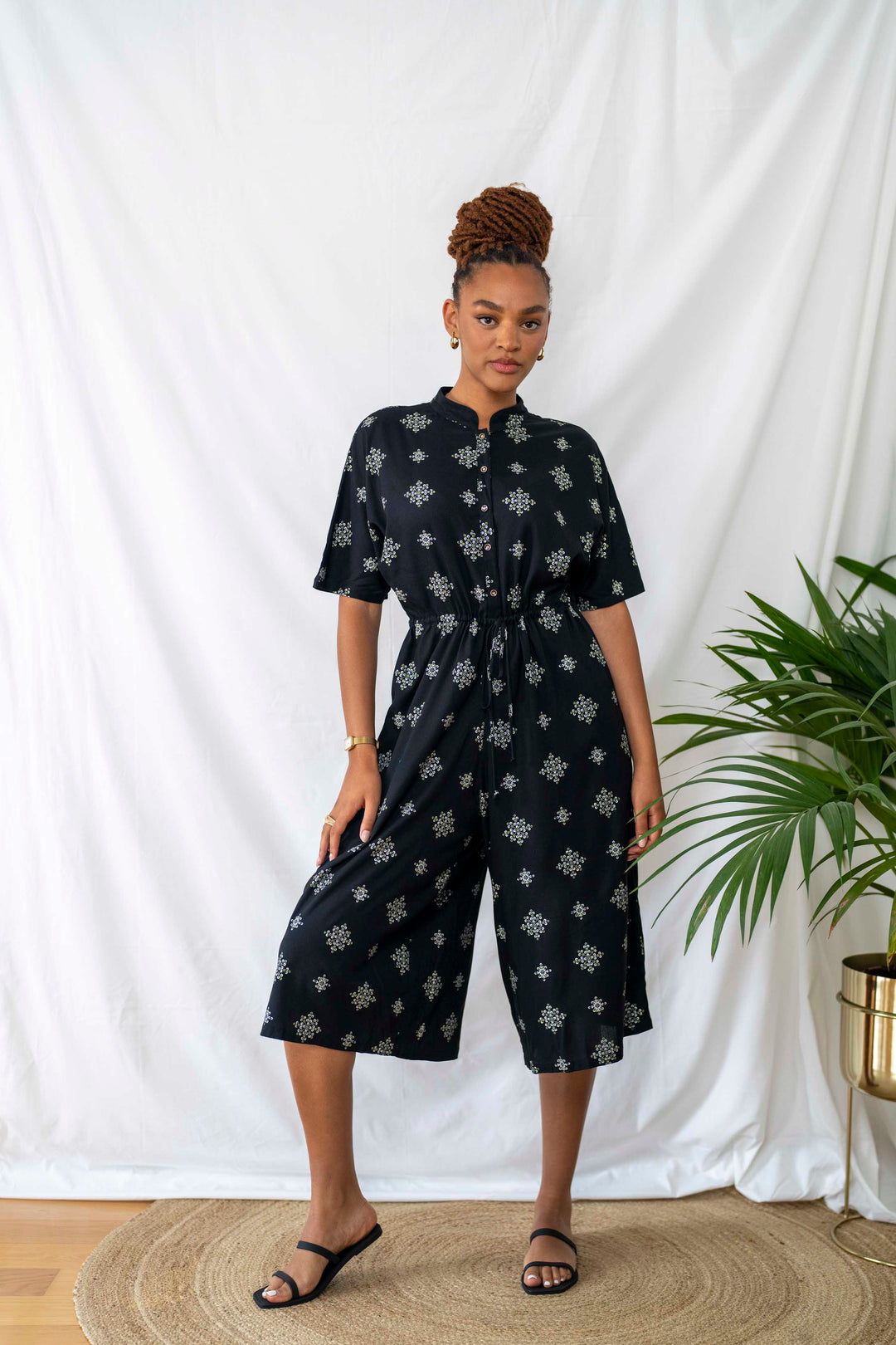 Gal Jumpsuit - The overall is oversized, with elbow-length sleeves